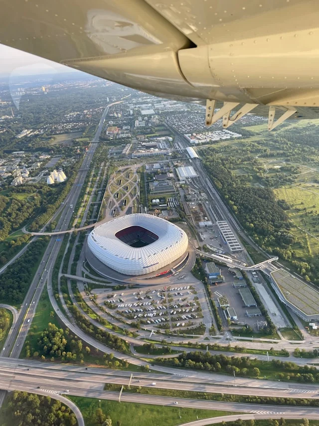 Birthday Gift Munich with airplane view of Allianz Arena and cityscape