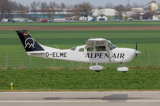 Wedding Venue Bavaria with ALPEN AIR aircraft landing in Augsburg
