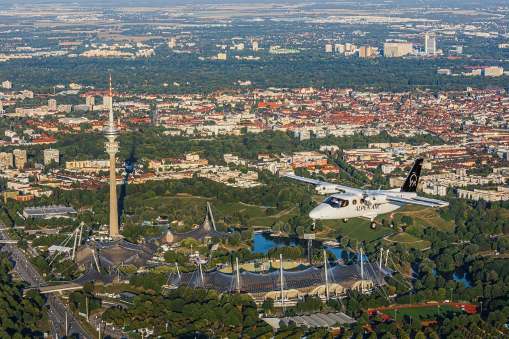 Scenic Flight over Munich with ALPEN AIR aircraft above Olympic Park