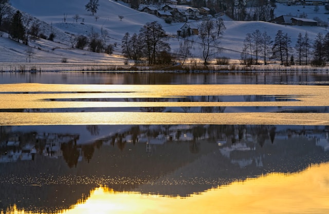 Best Places to Visit in Bavaria quiet lake with mountain panorama