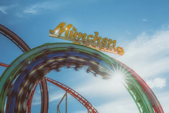 Fairground ride with Munich sign at the Oktoberfest